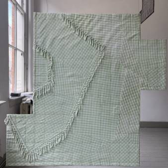 flattened brick, tablecloth of my mother, other side from aluminium and wire.